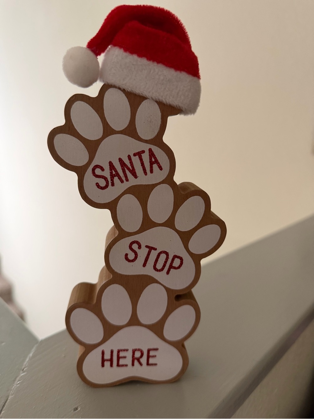 Hobby Lobby Santa Stop Here Dog Paw Stack. 8”x3”